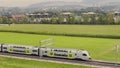 BLS RABe 515 026 Ã¢â¬â Double-decker train Ã¢â¬ÅMUTZÃ¢â¬Â from Bern to Belp seen from Gurten Hill. Bern